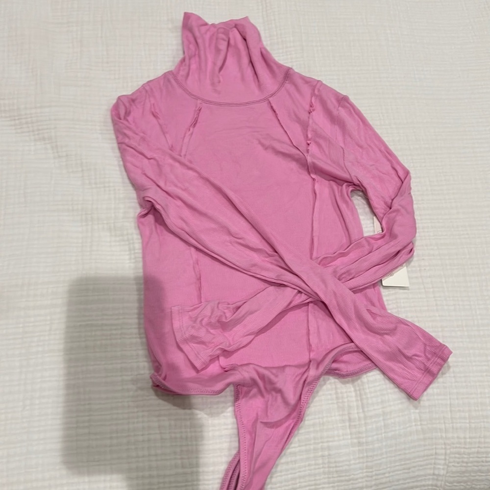 Pink turtleneck bodysuit